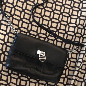Blk leather Calvin klein purse with silver chain detail